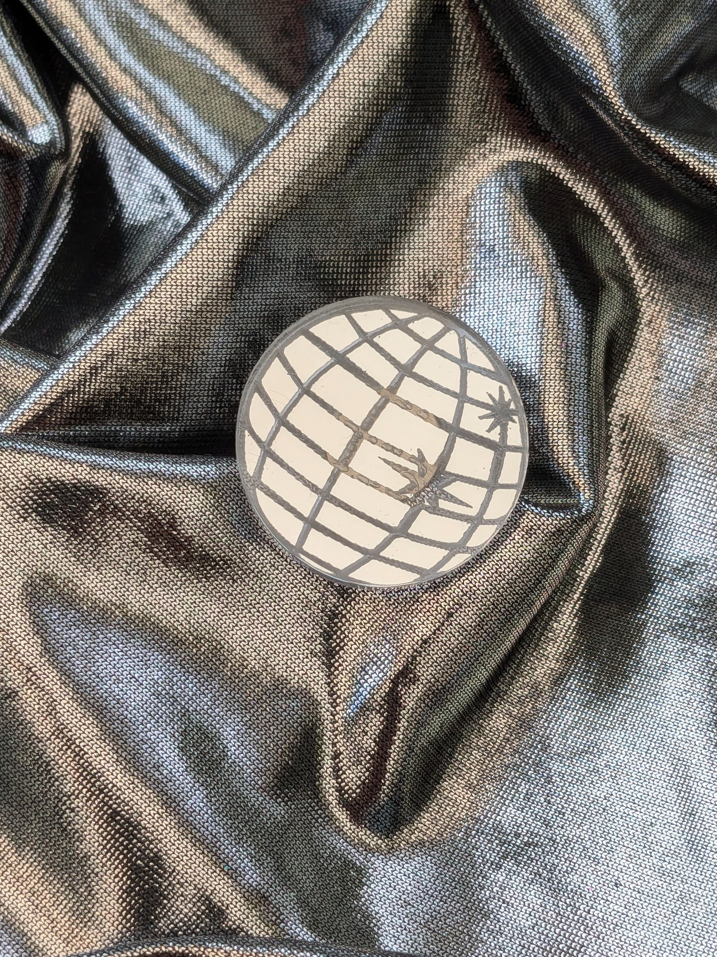 Mirrored Acrylic Disco Ball Pin on Silver Background