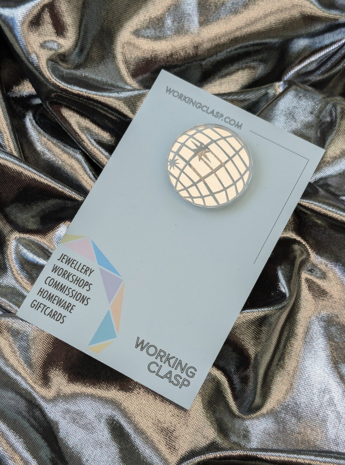 Mirrored Acrylic Disco Ball Pin on card on Silver Background