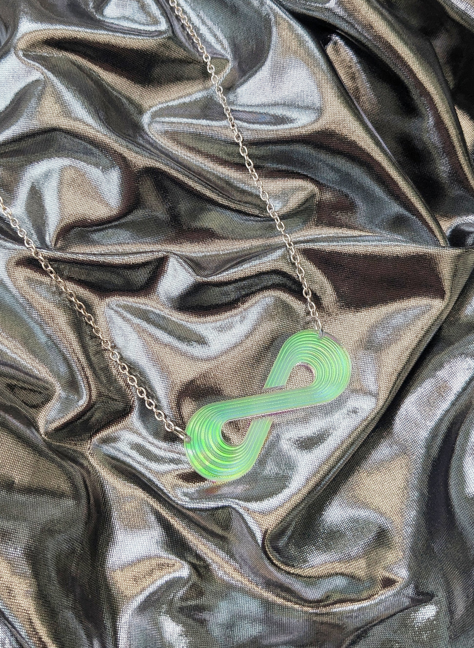 necklace made from mermaid acrylic in neurodiversity symbol