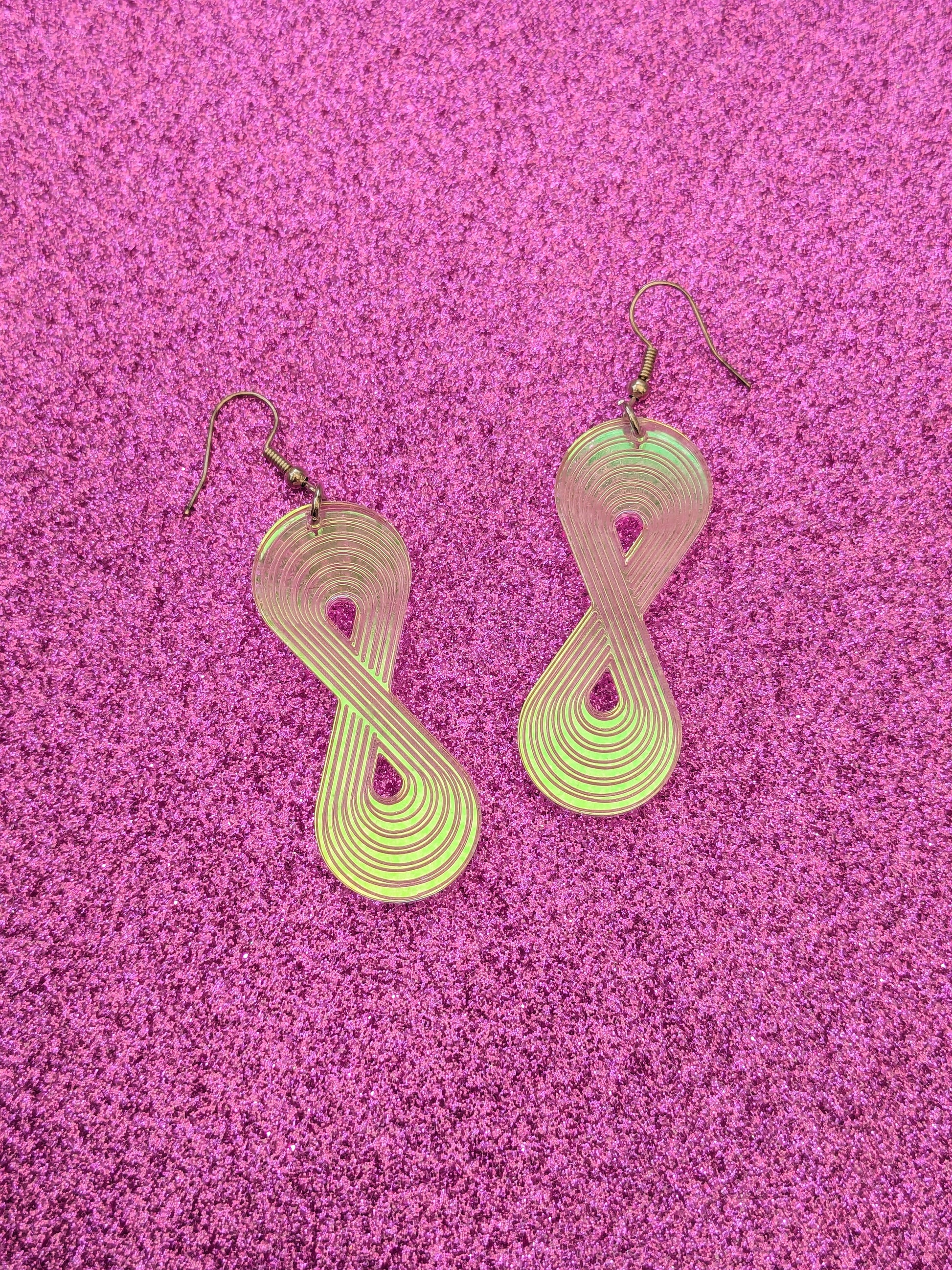 Mermaid acrylic earrings featuring the neurodiversity symbol