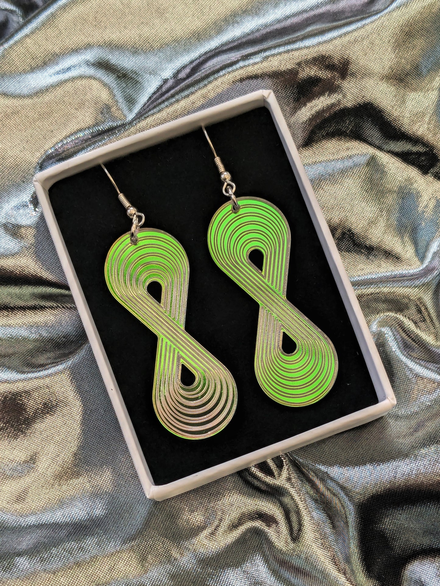 Mermaid acrylic earrings featuring the neurodiversity symbol