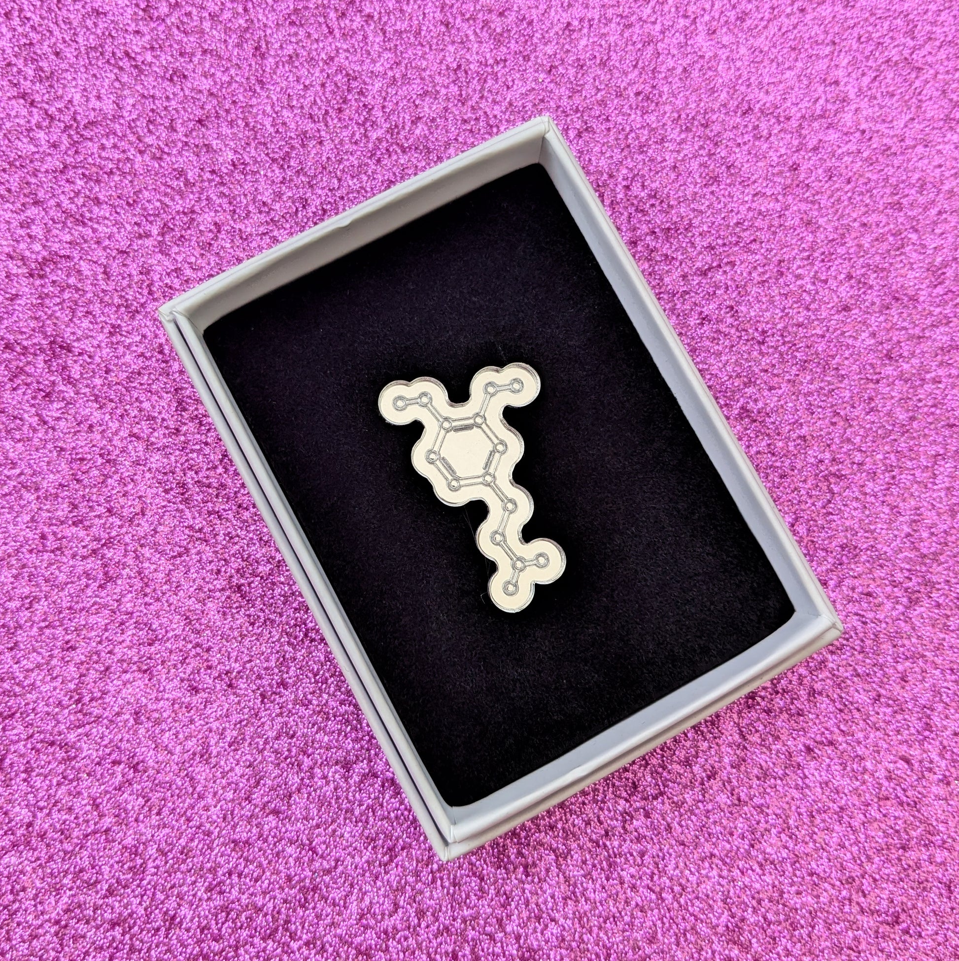 Silver acrylic dopamine molecule pin in box