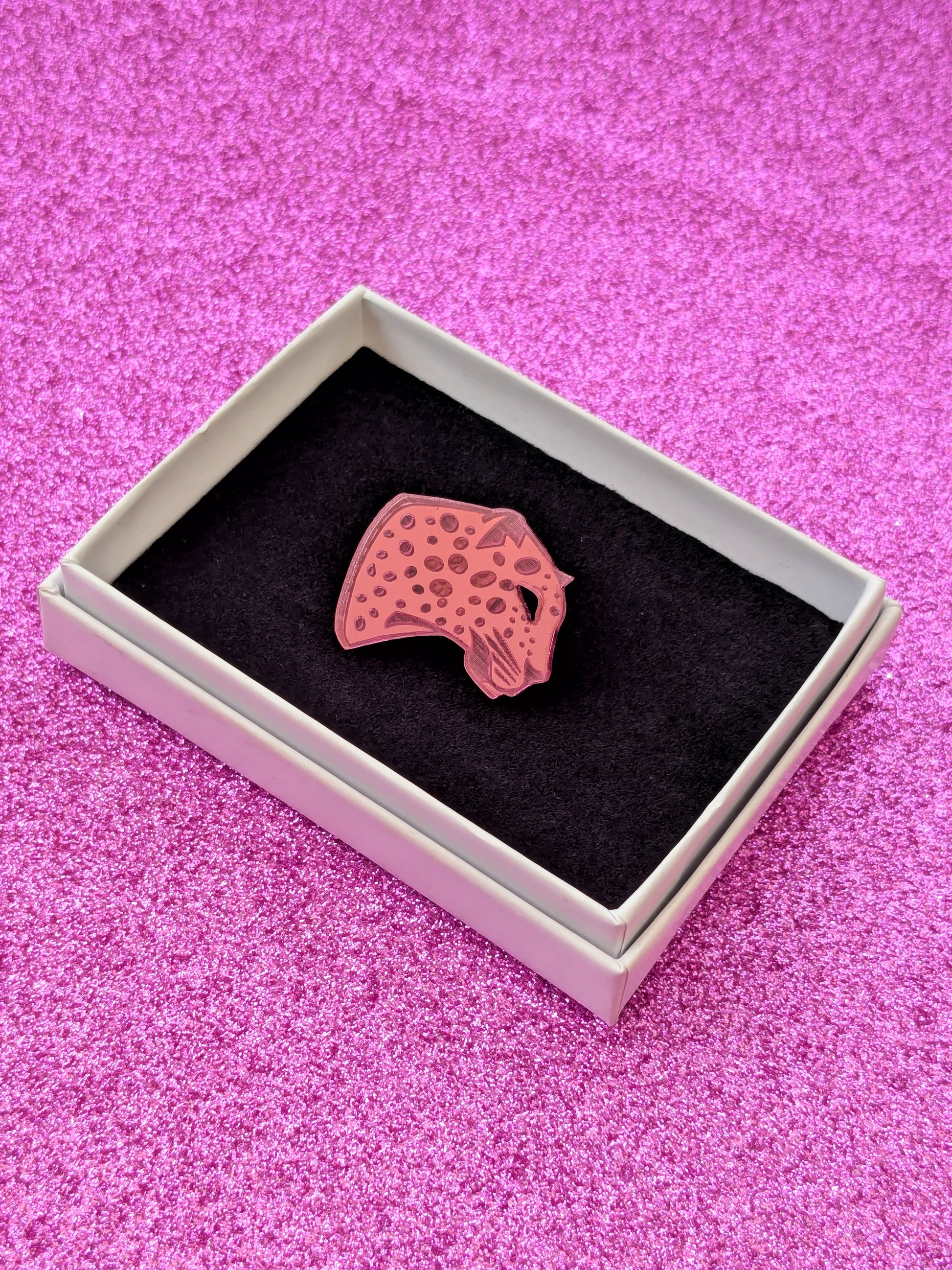 Handmade laser Leopard Heads in Pink Mirrored Acrylic with intricate leopard spot detailing