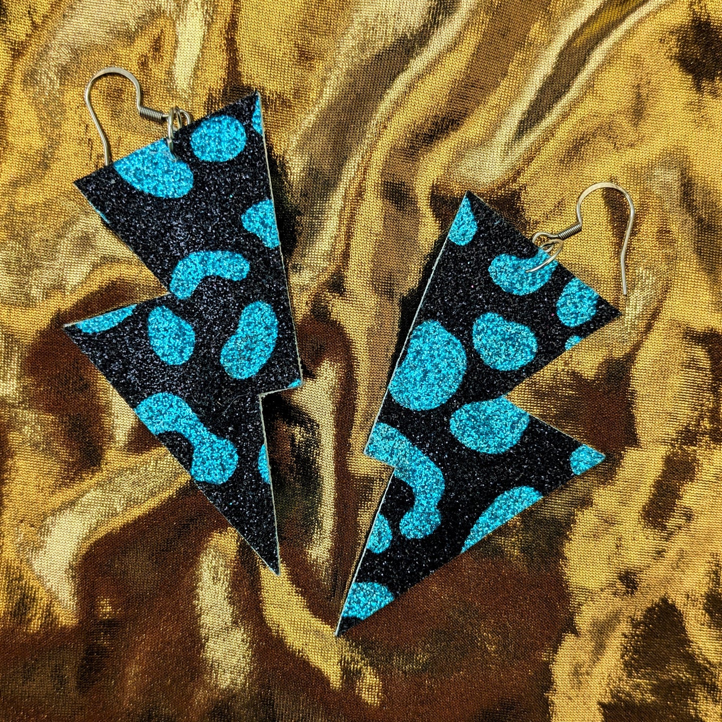 Medium Leopard Print lightning bolt earrings in turquoise 