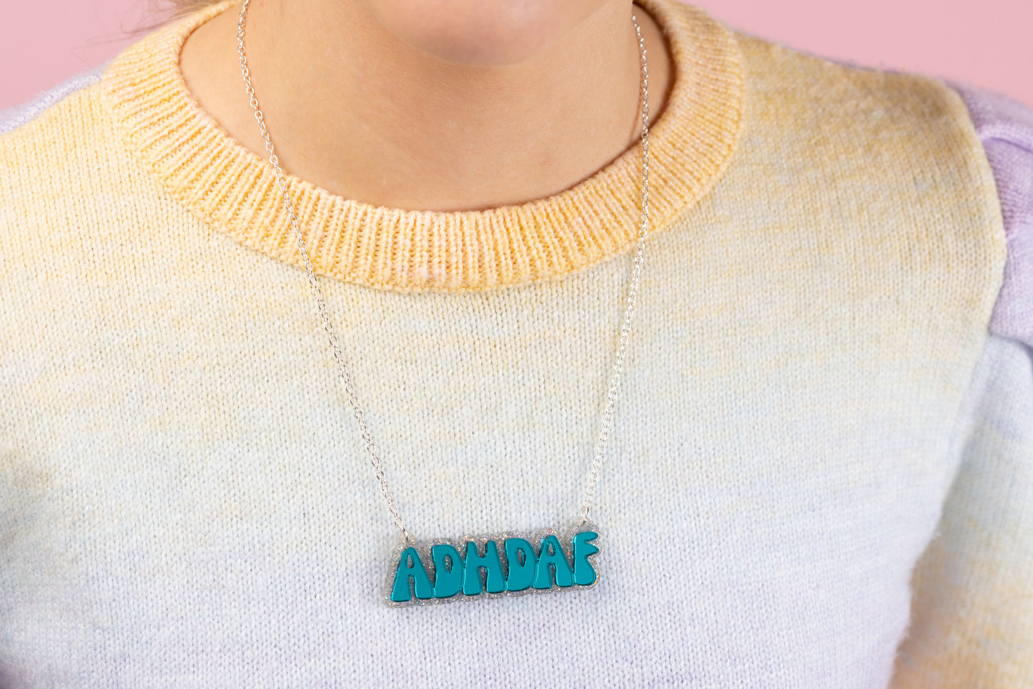 Model wears Turquoise ADHDAF necklace with silver chain